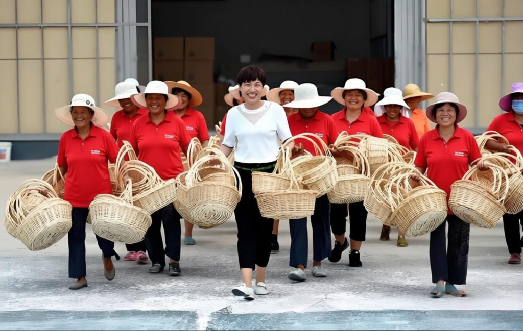 Skilled artisan team with finished handwoven baskets, showcasing stable supply and on-time delivery capabilities for global clients.