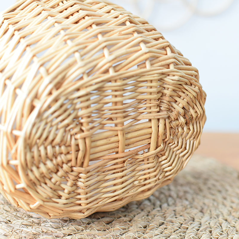 Close-up of the handwoven willow basket bottom, showcasing natural willow craftsmanship