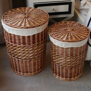 Set of 2 round wicker laundry baskets with lids and fabric lining, made from natural willow