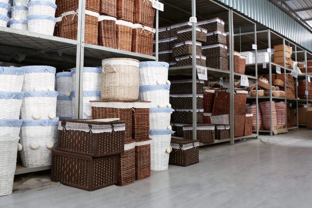 Woven Natural baskets factory warehouse with 2000 sqm space and 200,000 units in stock, showcasing reliable B2B supply capacity for home storage and decor products.