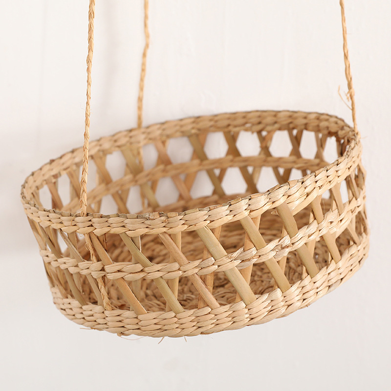 Close-up detail of natural fiber woven structure, round basket rim and open lattice weave pattern