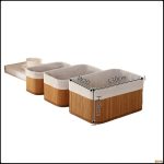 Bamboo nesting storage boxes organizing items on an open shelf