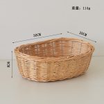 Shallow willow trays holding everyday items on a console table