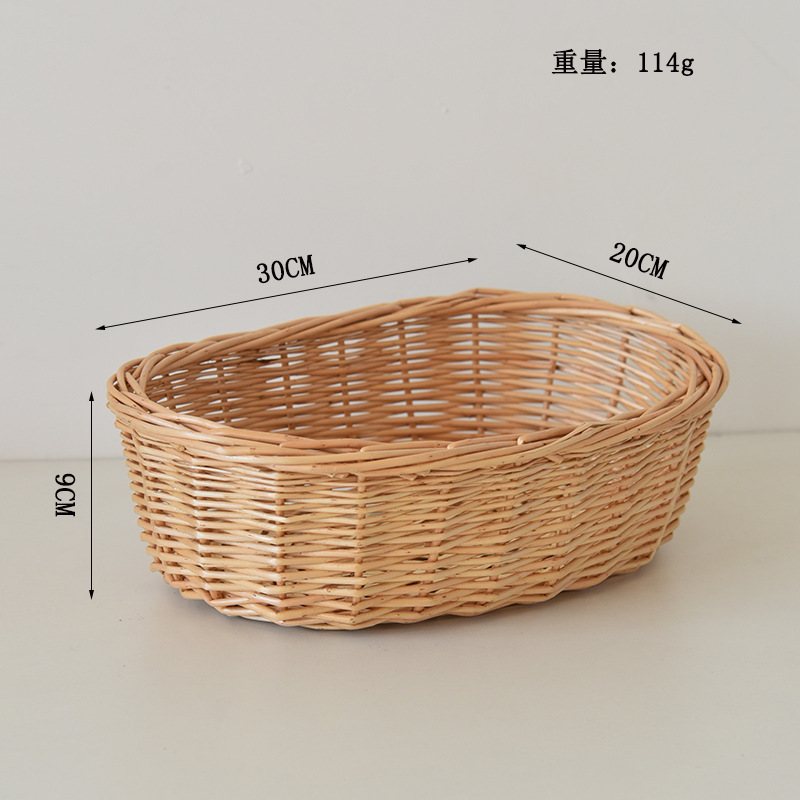 Shallow willow trays holding everyday items on a console table