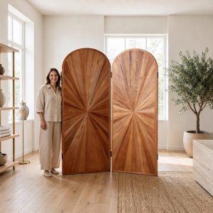 Two marquetry screen arches photographed full height beside shelving in a bright showroom