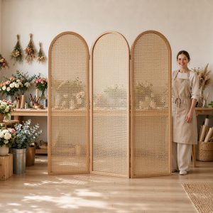 Open cane weave room divider dividing a working florist studio among buckets of fresh flowers