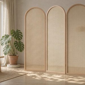 Natural wood arched screen casting patterned light across a calm sunlit living room floor