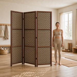 Open weave screen throwing a dotted light pattern across wooden floors in a bright yoga studio