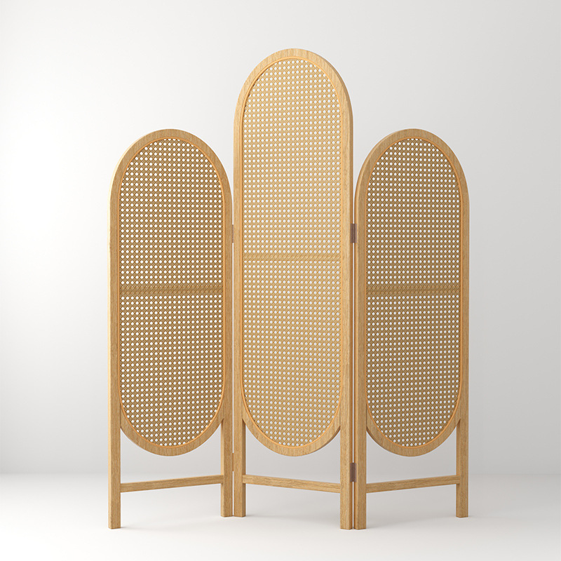 Hexagonal cane webbing screen in rounded oval frames in natural oak tone on a plain background