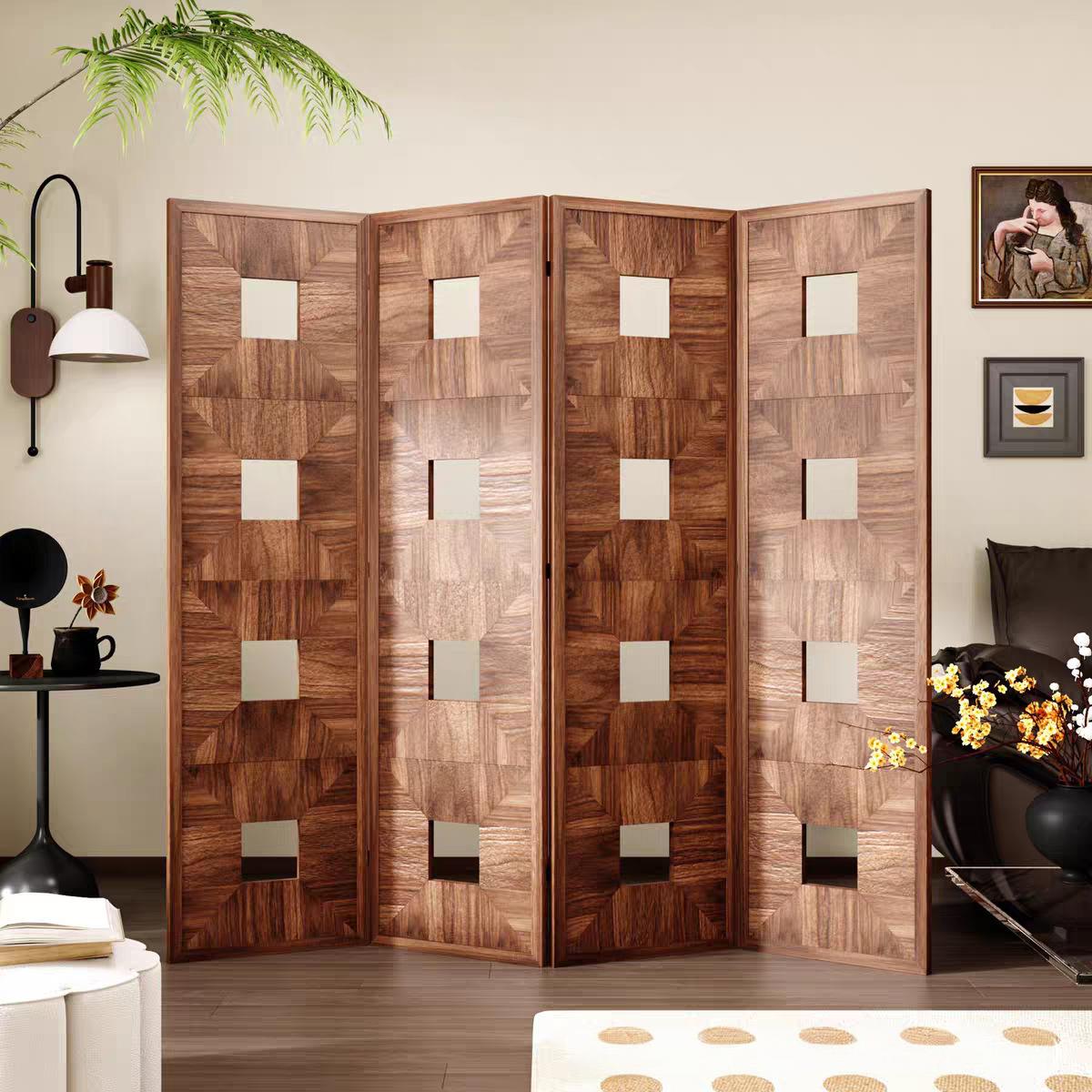 Book matched diamond veneer decorative screen with square cutouts behind a dark leather sofa in a lounge