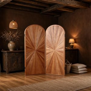 Radiant starburst inlay room divider against dark plaster and beam ceilings in a rustic suite