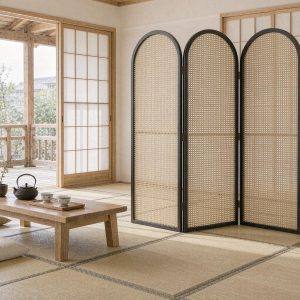 Black framed rattan cane ovals in a japandi tea room with tatami mats and shoji doors