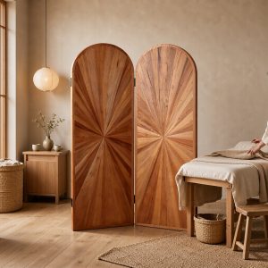 Sunray wood marquetry screen beside a massage table in a serene spa treatment room setting