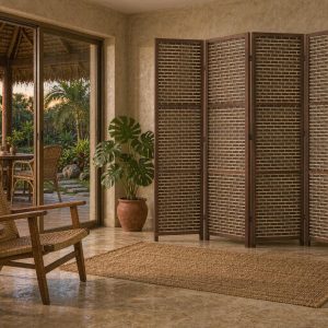 Breathable brick weave patio divider in a walnut frame opening onto a palm garden in a tropical villa