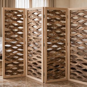 Flowing wave carved screen slats in dark grain timber shielding a bedroom desk corner